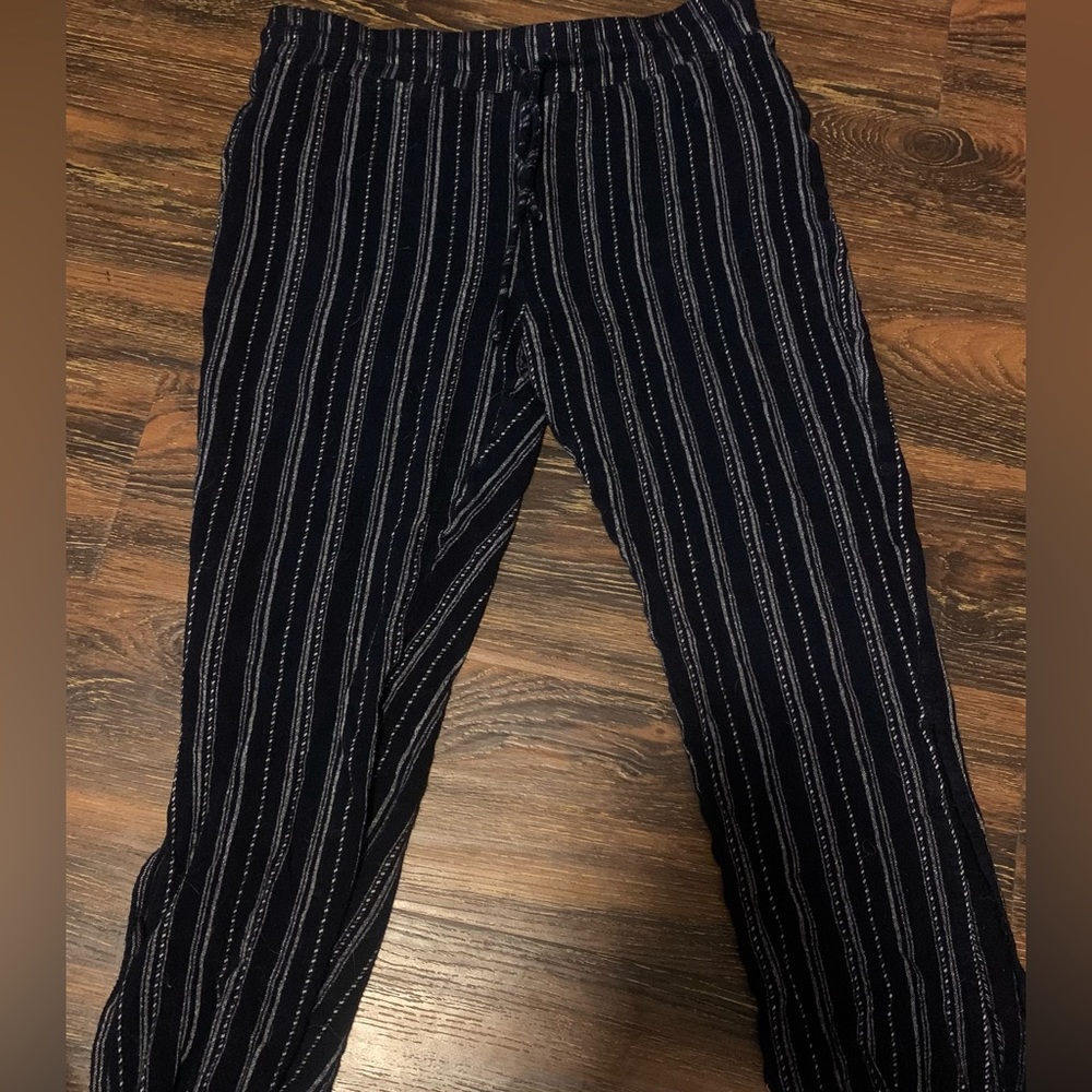 Saleing these dark blue striped pants in good condition